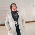 ميس نرمين عبدالله استاذة التأسيس و الدراسات الاجتماعية رقم 1 فى اكتوبر : ” طلابي لا يعرفوا سوى الدرجة النهائية “